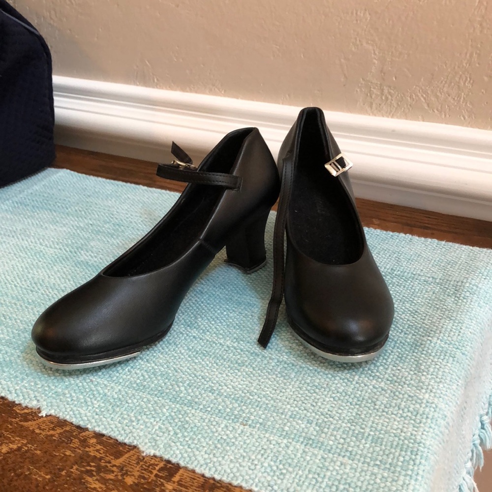 Black heeled tap shoes
